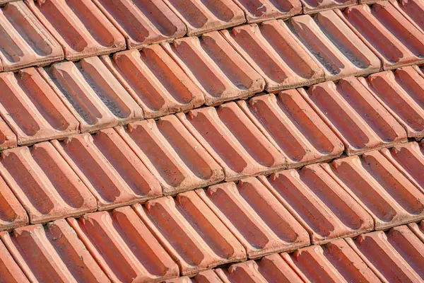 A roof stripped back to new battens and breathable membrane